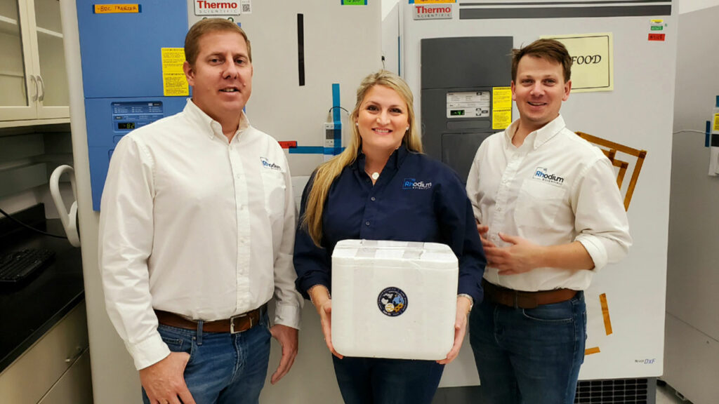 The Rhodium Scientific team turns over Space Microbiome samples to NASA at Kennedy Space Center prior to SpaceX CRS 20 launch (left to right: Heath J. Mills, Olivia G. Holzhaus, R.P. Oates)