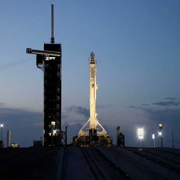 SpaceX’s Falcon 9 rocket and cargo Dragon spacecraft stand ready for launch at NASA Kennedy Space Center’s Launch Complex 39A in Florida on July 14, 2022.
