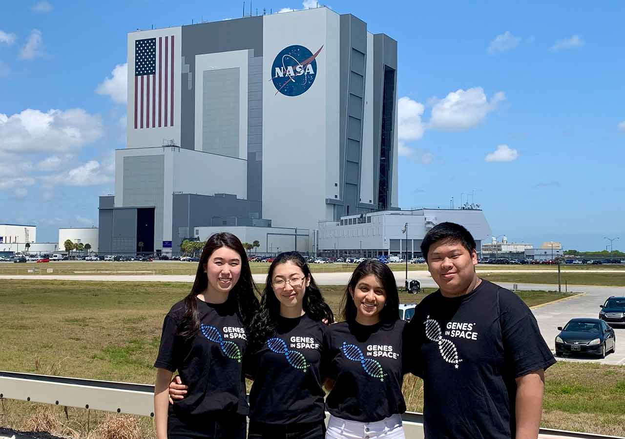 Aarthi and her teammates David Li, Rebecca Li, and Michelle Sung at Kennedy Space Center before their project launched in May 2023