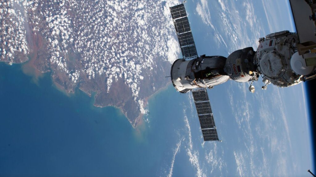 Soyuz MS-27 spacecraft docked to the Prichal module above Madagascar