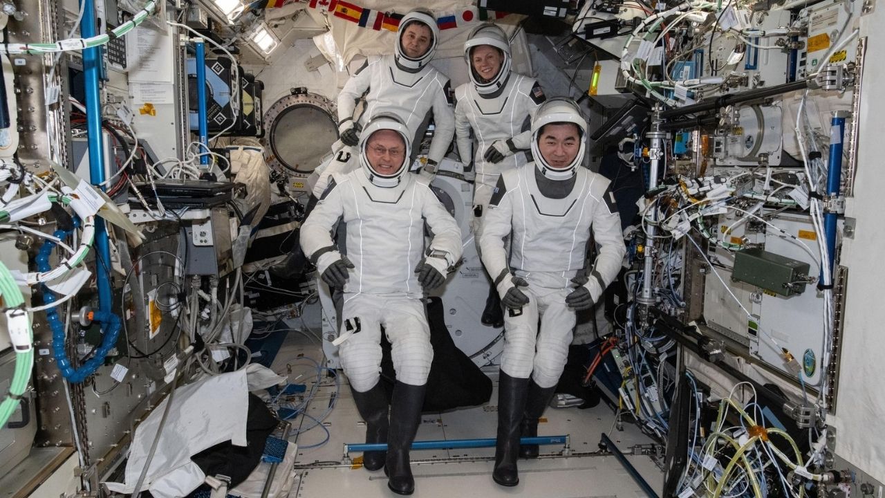 Four SpaceX Crew-11 members gather for a crew portrait.