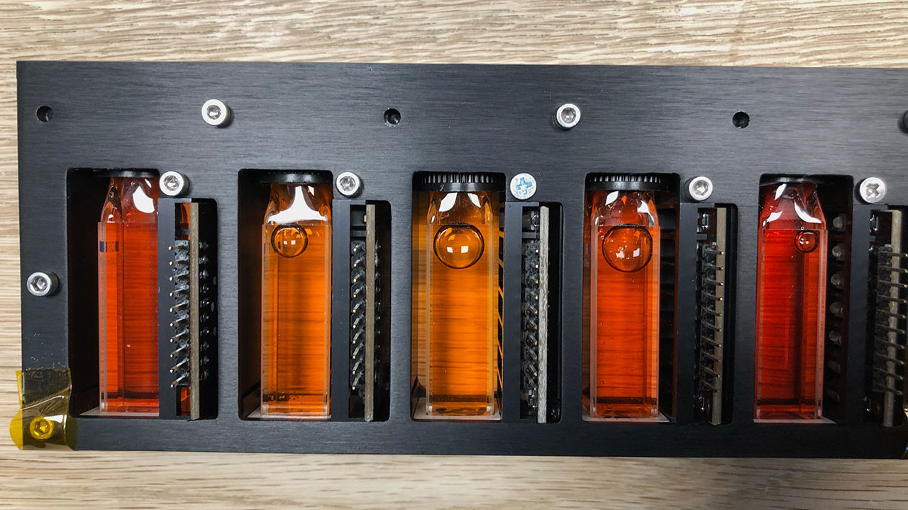 Five fluid-filled cuvettes prepared for launch to the ISS as part of the investigation.