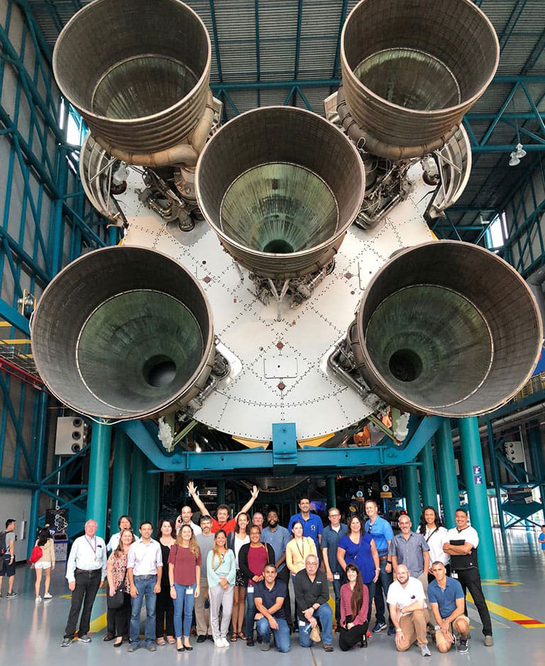 Upward-9_2-Sanofi-KSC-v2 The Sanofi team visiting Kennedy Space Center ahead of the launch of their Celestial Immunity project.